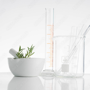 a mortar, a measuring cup and a measuring cylinder